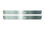 Two long silver-finished door sill plates with 370Z lettering on a light background, straight-on view.