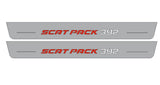 Catalog illustration of two long gray door sill plates with red Scat Pack and white 392 lettering on a white background.