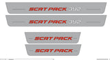 Catalog illustration of four gray door sill plates with red Scat Pack and white 392 lettering on the long pair, Scat Pack lettering on the short pair on a white background.