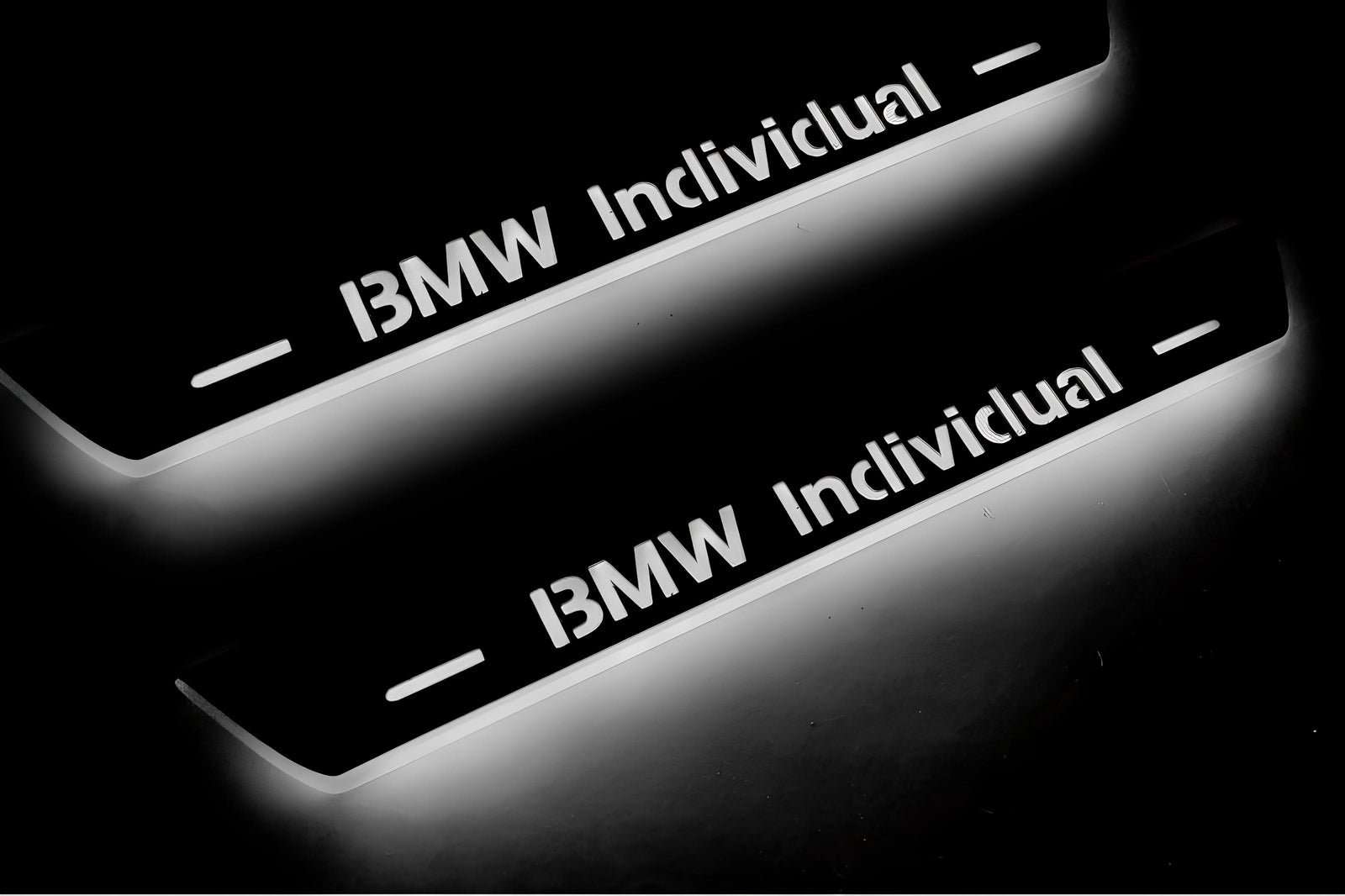 BMW X5 E53 1999+ illuminated entry guards in stainless steel with BMW Individual logo
