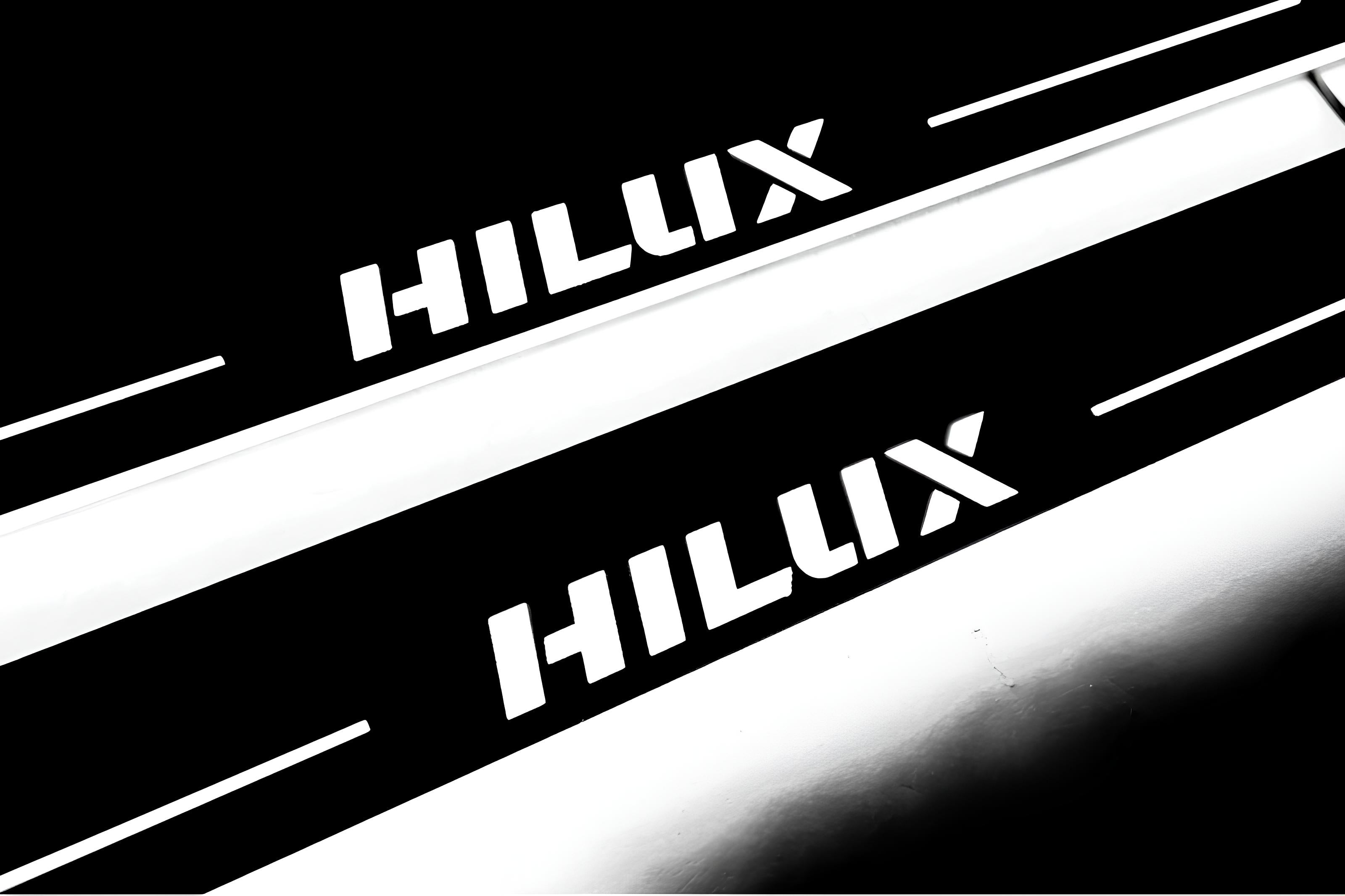 Illuminated LED Door Sill Tread Plates Toyota Hilux VIII 2015+ With Hilux Logo Toyota Led Door Sills opdesign