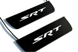 Dodge Durango III 2011+ illuminated entry guards in matte black coated stainless steel with SRT logo