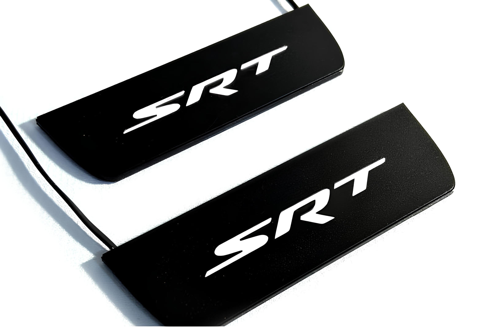 Dodge Durango III 2011+ illuminated entry guards in matte black coated stainless steel with SRT logo
