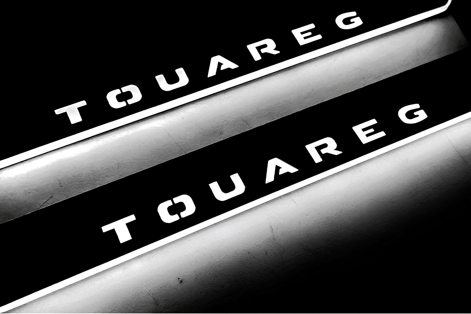 Volkswagen Touareg III 2018+ stainless steel illuminated entry guards with Touareg logo