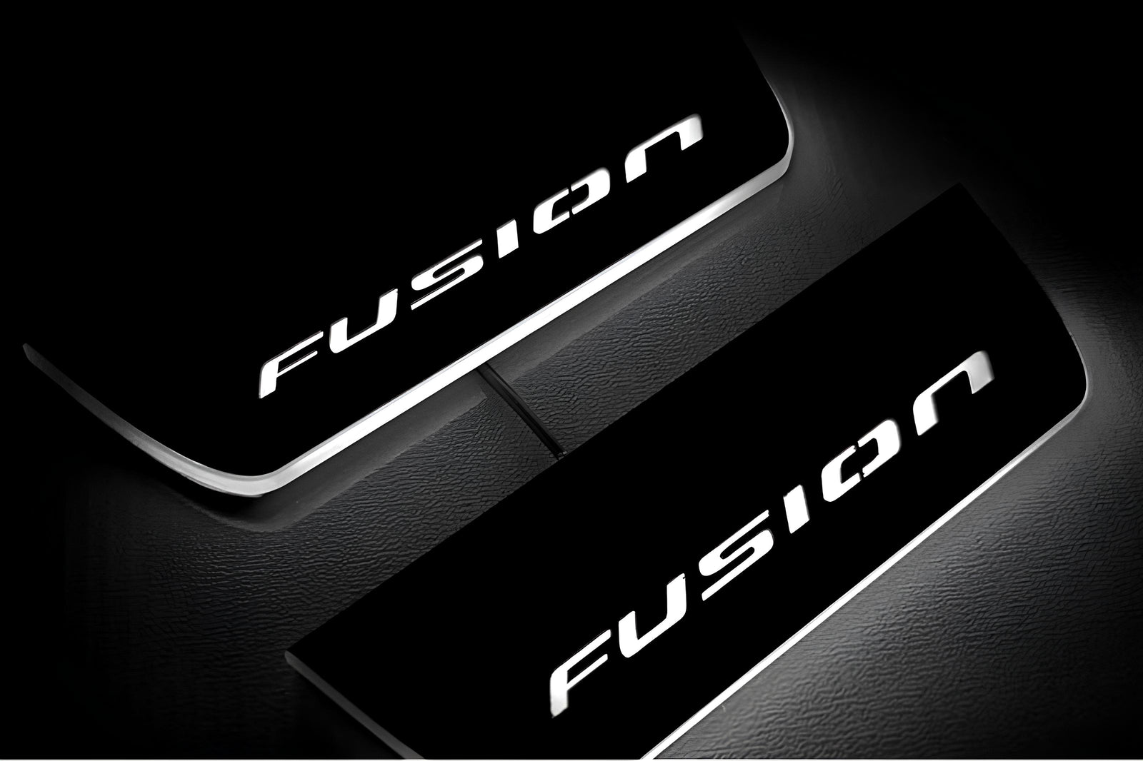Ford Fusion II CD4 2012+ stainless steel LED door sill plates with Fusion logo