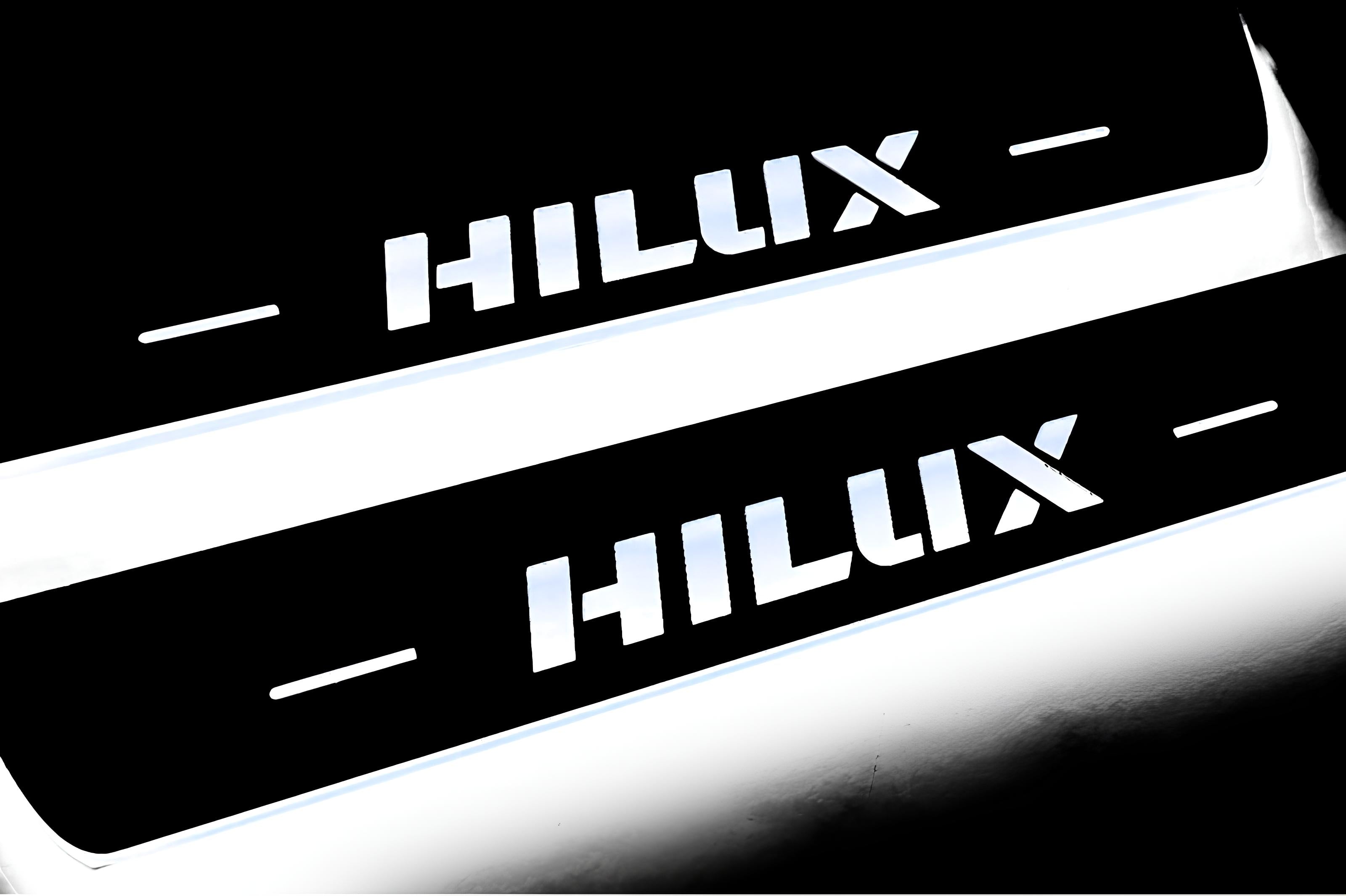 Illuminated LED Door Sill Tread Plates Toyota Hilux VIII 2015+ With Hilux Logo Toyota Led Door Sills opdesign