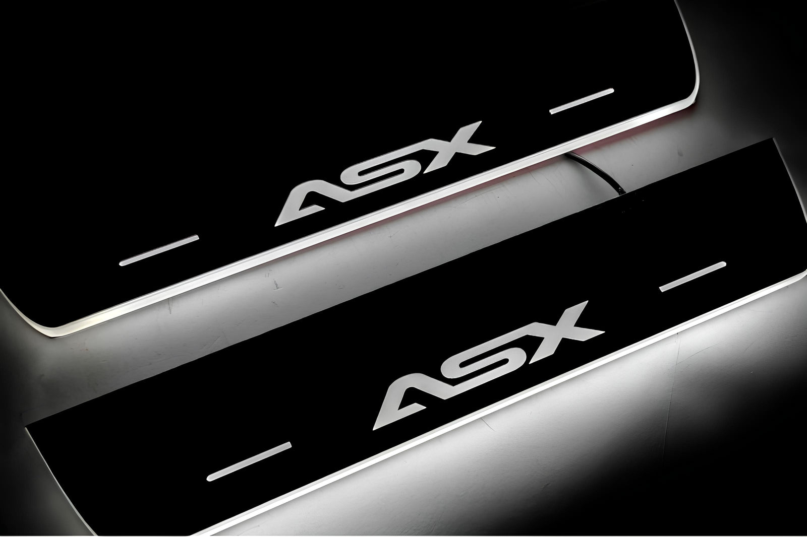 Mitsubishi ASX I 2010+ illuminated entry guards in stainless steel with ASX logo