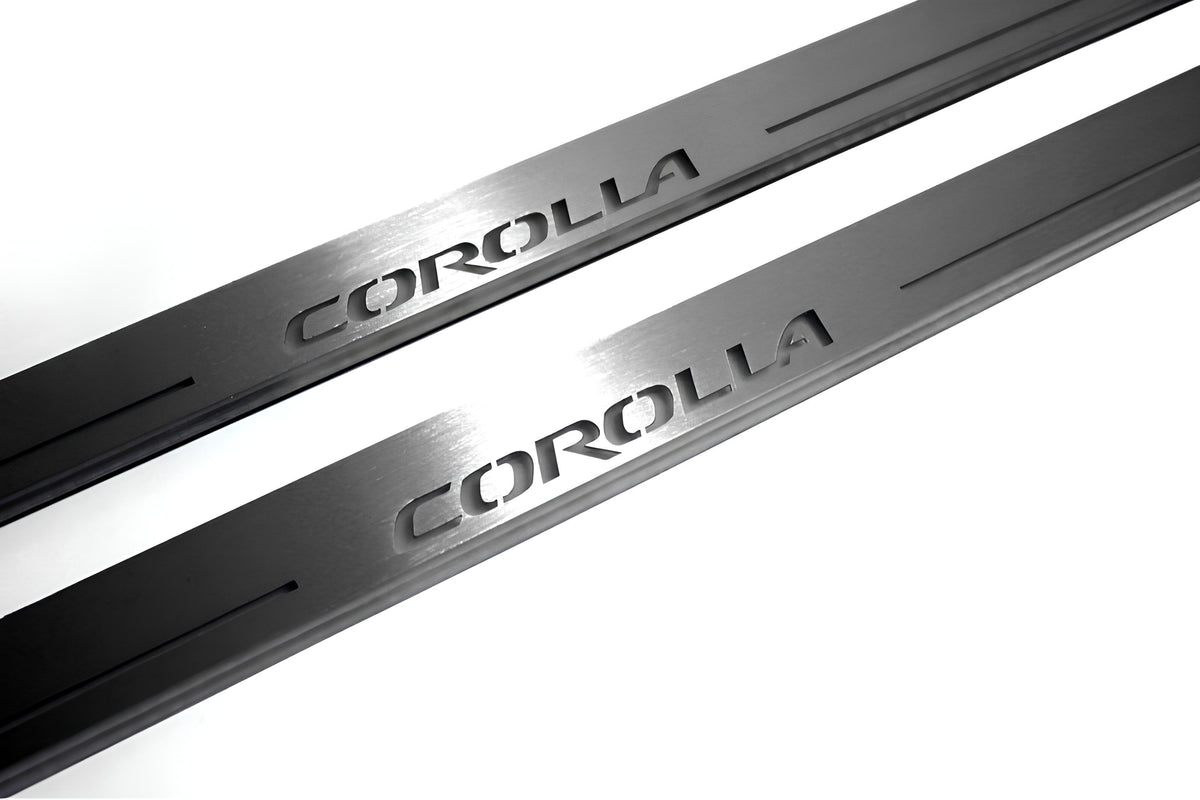 Toyota Corolla XI 2013+ illuminated entry guards in stainless steel with Corolla logo