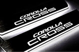 Toyota Corolla Cross Stainless LED Door Sills – Corolla Cross Logo