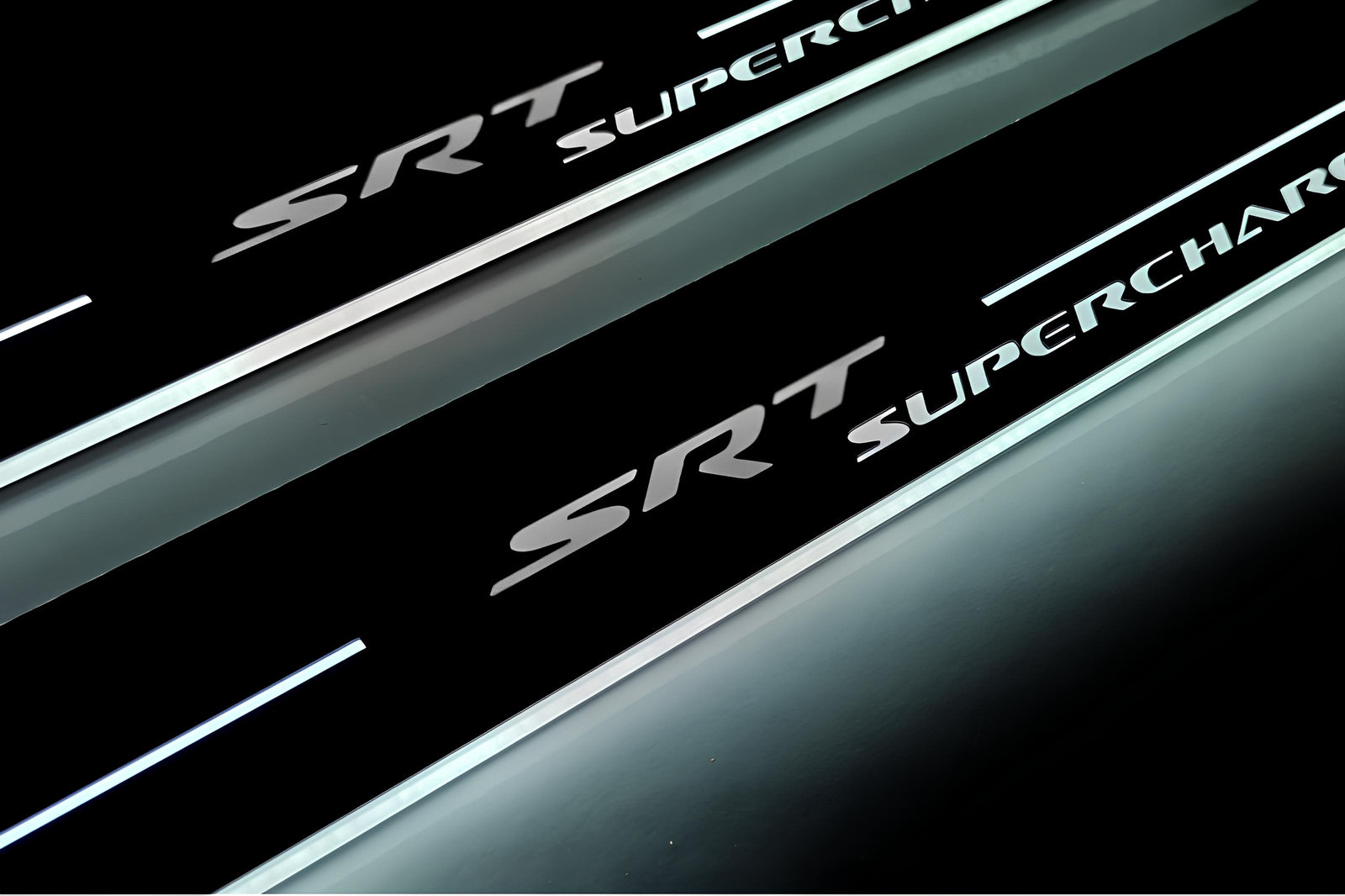 Jeep Grand Cherokee IV WK2 2010+ stainless steel LED door sill plates with SRT Supercharged logo