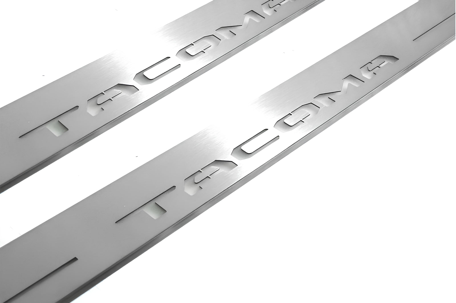 Toyota Tacoma III 2016+ stainless steel illuminated entry guards with Tacoma logo