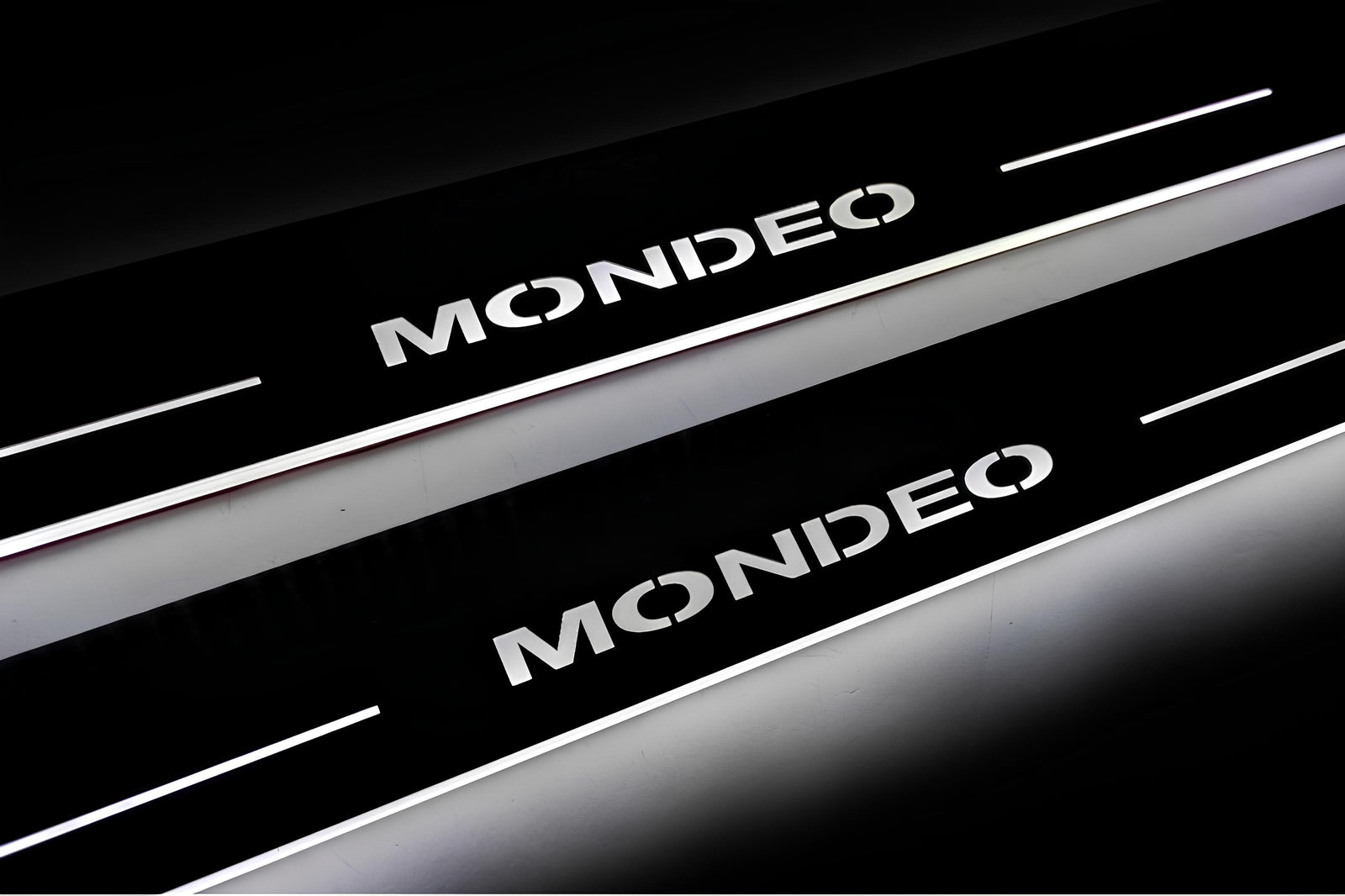 Ford Mondeo IV 2007+ entry guards in stainless steel with Mondeo logo