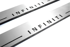 Close-up of Infiniti lettering and linear slots in silver-finished door sill plates.