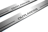 Mitsubishi Outlander II CW 2007+ LED door sill plates in stainless steel with Outlander logo
