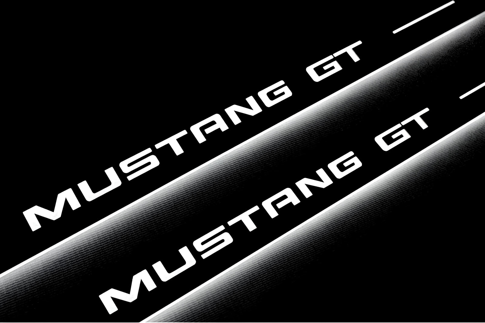 Ford Mustang V S197 2005+ illuminated entry guards in stainless steel with Mustang GT logo