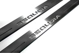 Close-up of Sequoia lettering and linear slots in silver-finished door sill plates.