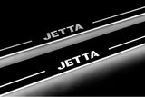 Volkswagen Jetta VII 2019+ LED door sill plates in stainless steel with Jetta logo