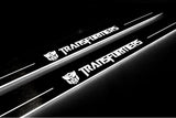 Chevrolet Camaro V E37 2009+ stainless steel LED door sill plates with Transformers logo
