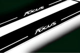 Ford Focus III 2011+ stainless steel illuminated entry guards with Focus logo