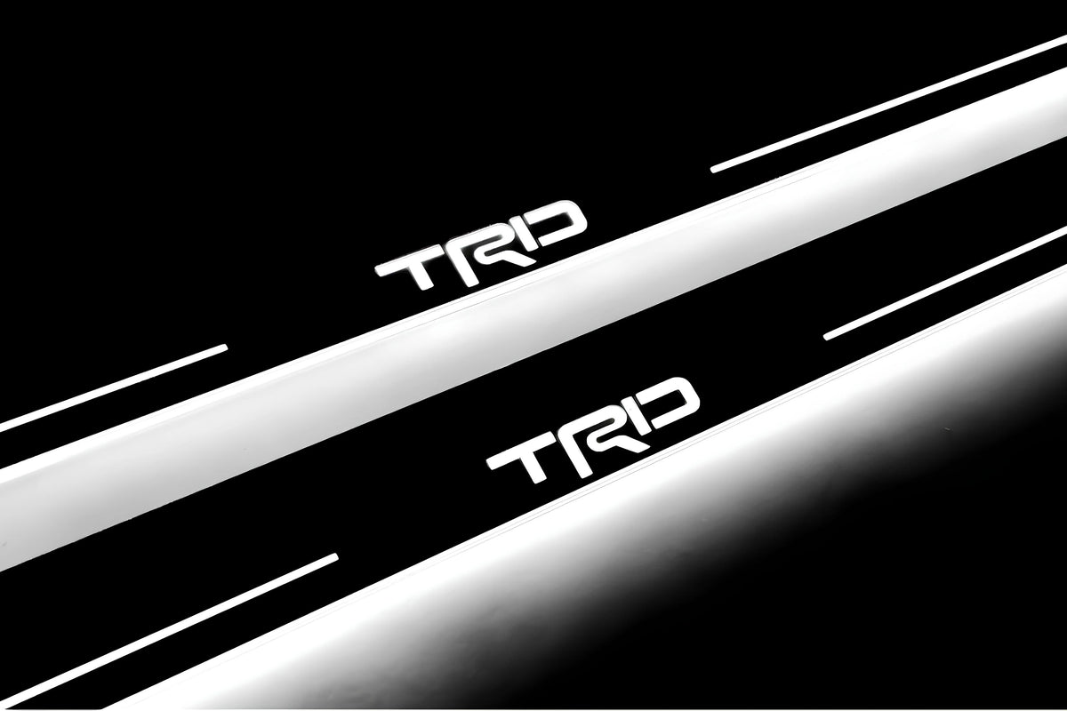 Toyota Camry V70 2018+ LED door sill plates with TRD logo