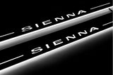 Toyota Sienna III XL30 2011+ LED door sill plates in stainless steel with Sienna logo