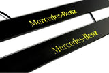 Mercedes E W211 2002+ entry guards in stainless steel with Mercedes-Benz logo