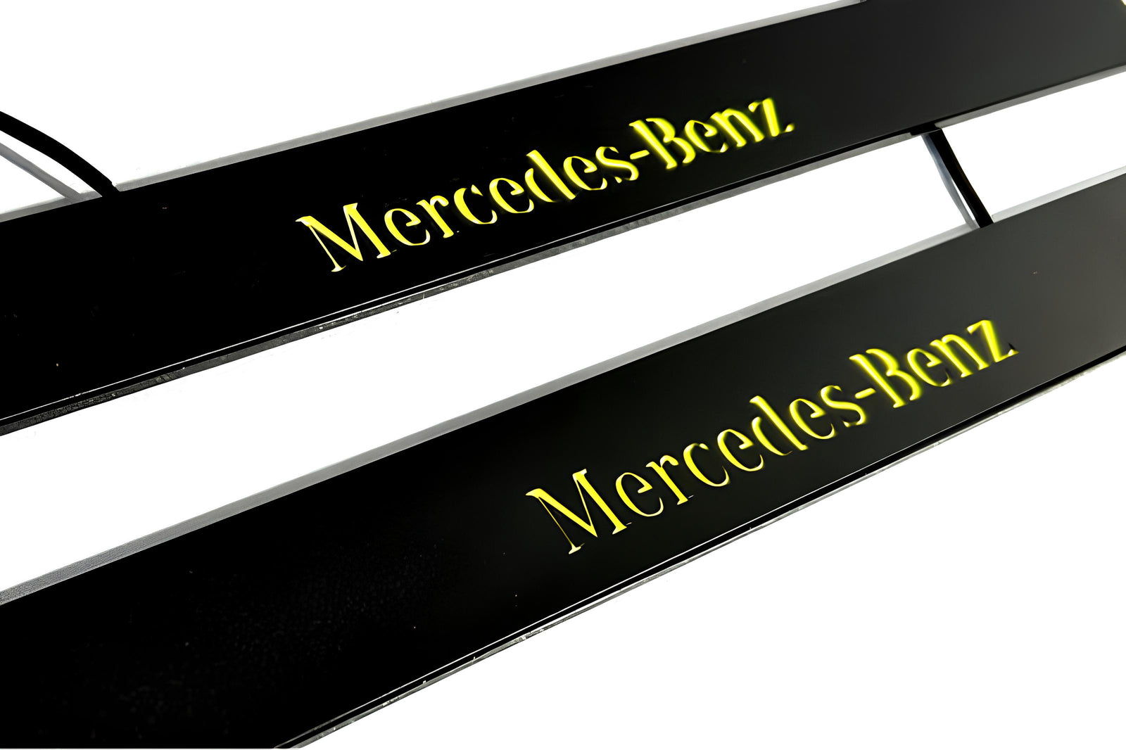 Mercedes E W211 2002+ entry guards in stainless steel with Mercedes-Benz logo