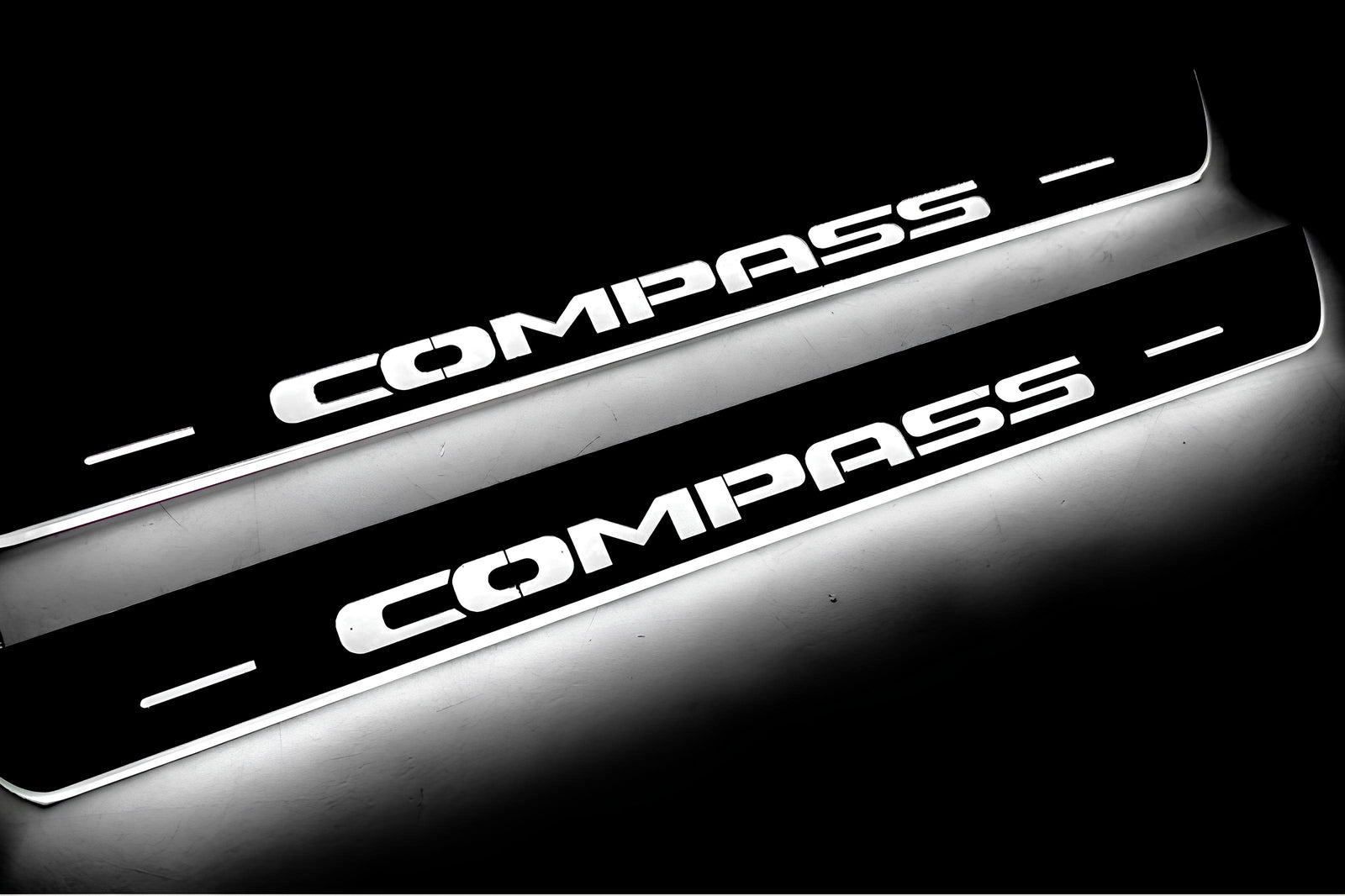 Jeep Compass II 2016+ illuminated entry guards in stainless steel with Compass logo