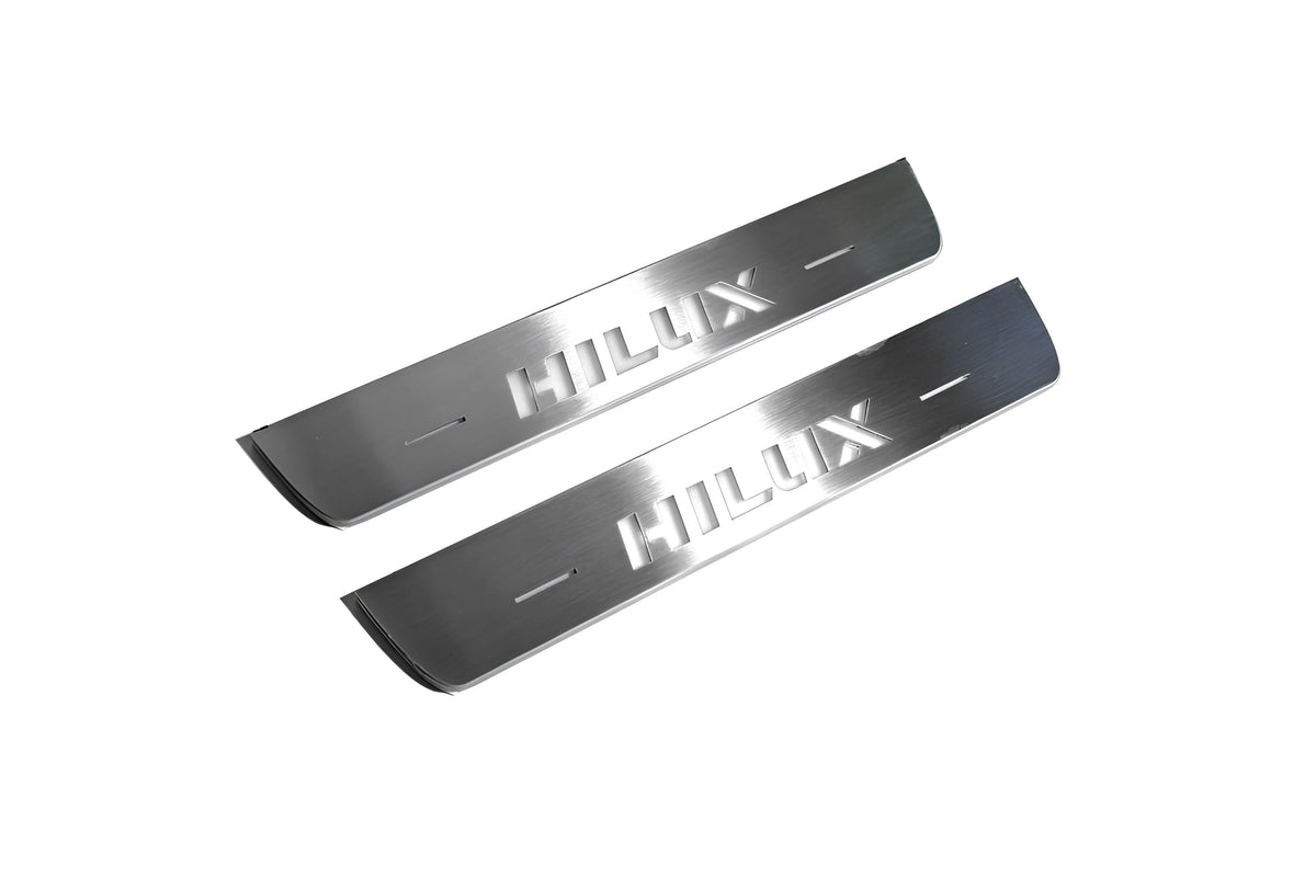 Toyota Hilux VIII 2015+ door sill plates in stainless steel with Hilux logo