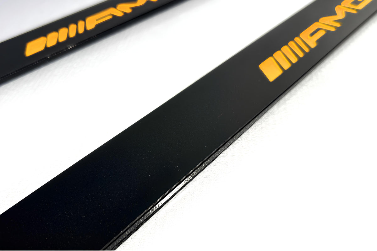 Mercedes A W176 2012+ illuminated door sill protectors in stainless steel with AMG logo