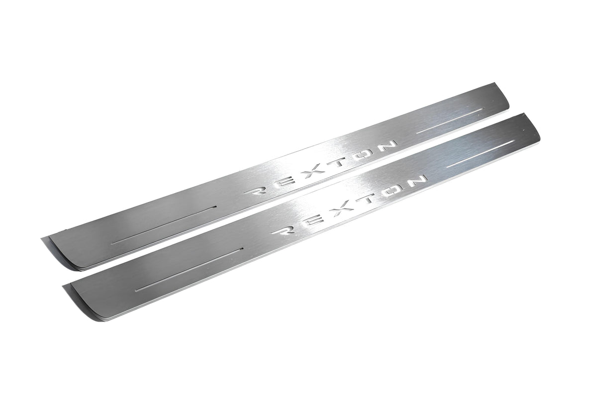 SsangYong Rexton II 2006+ door sill plates in stainless steel with Rexton logo