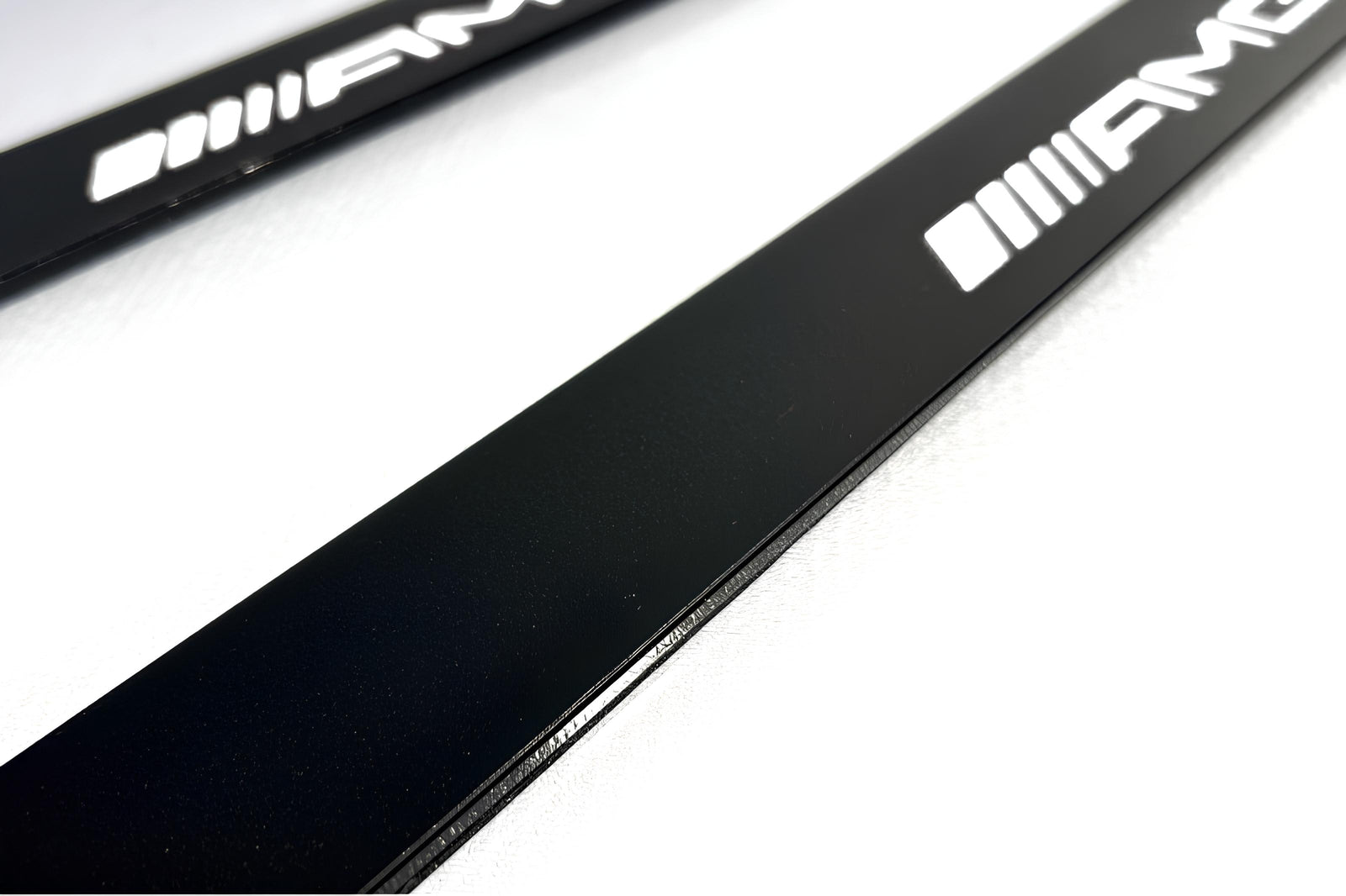 Mercedes E W211 2002+ stainless steel illuminated entry guards with AMG logo