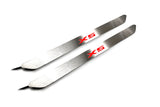Two narrow silver door sill inserts with red X5 lettering and attached wires, angled view on a white background.