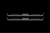Two long door sill plates with 5008 lettering and edges illuminated in white, straight-on view on a dark background.