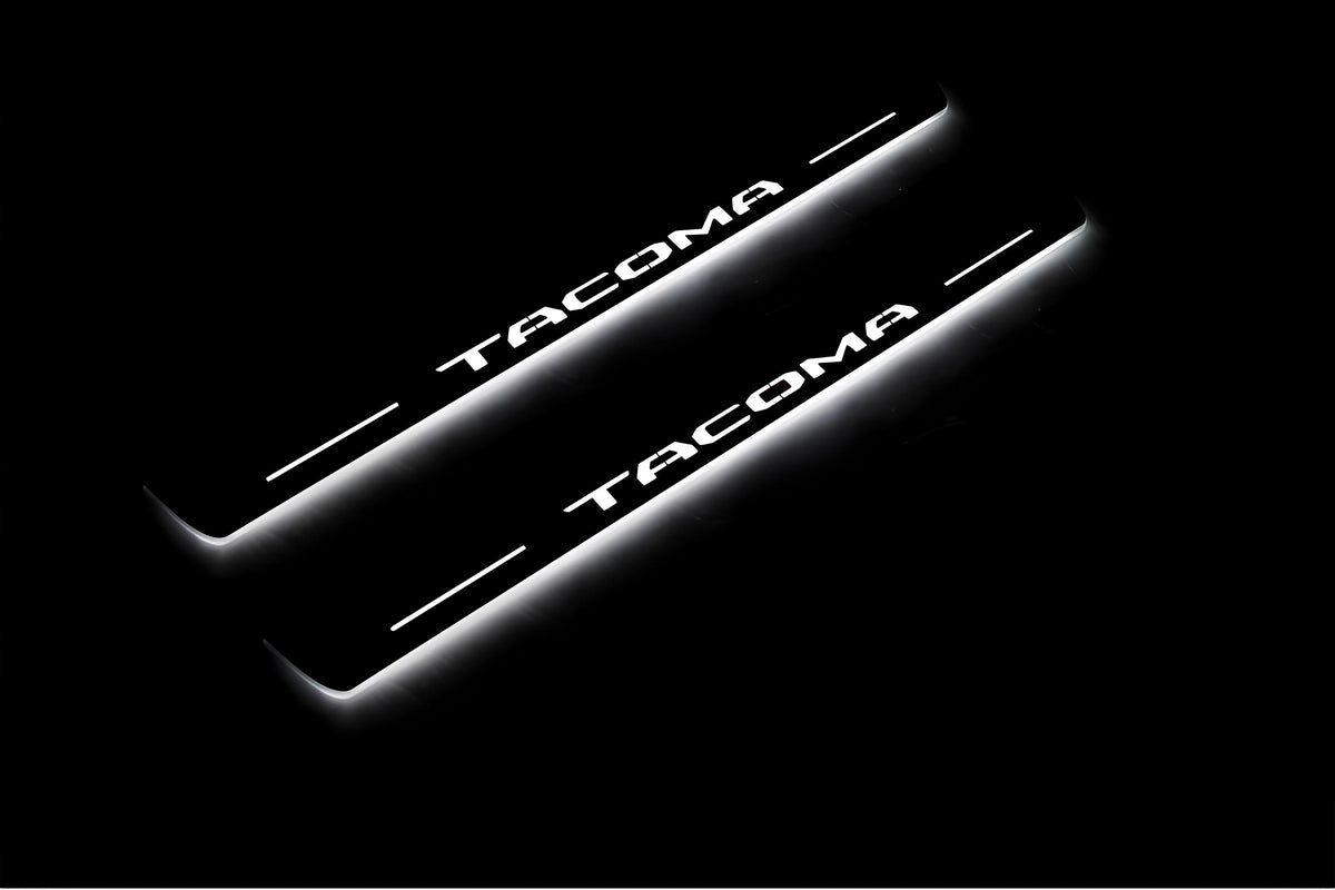 Toyota Tacoma III 2016+ LED door sill plates with Tacoma logo