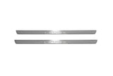 Two long silver-finished door sill plates with Evoque lettering on a light background, straight-on view.