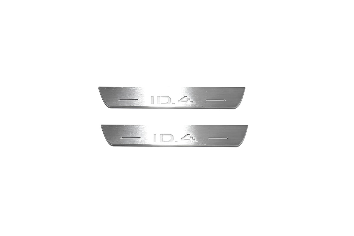 Two short silver-finished door sill plates with ID.4 lettering on a light background, straight-on view.