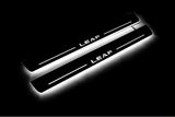Nissan Leaf I 2010+ LED door sill plates with Leaf logo