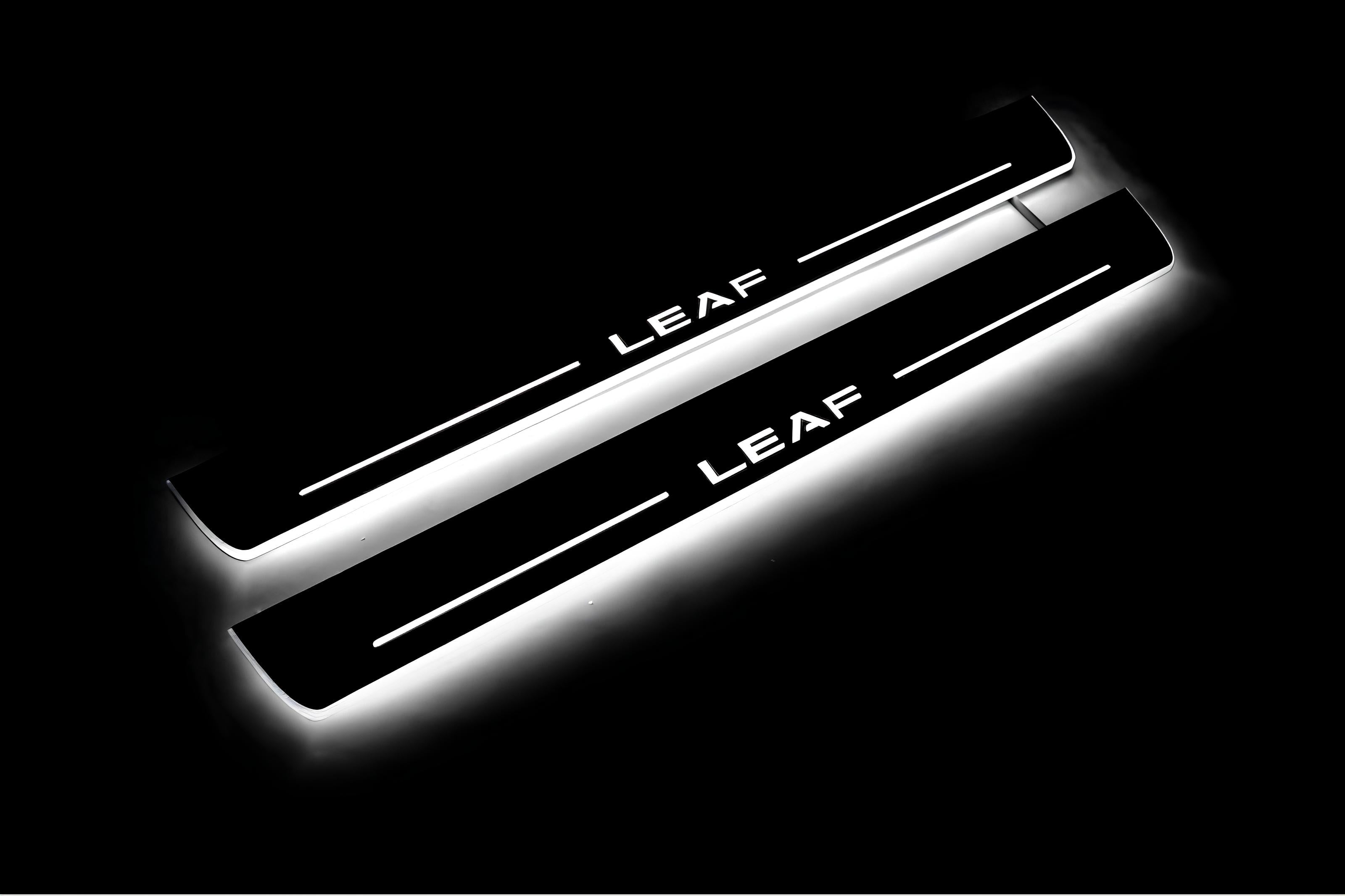 Illuminated LED Door Sill Tread Plates Nissan Leaf II 2017+ With Leaf Logo Nissan Led Door Sills opdesign