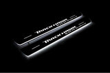 Jeep Grand Cherokee IV WK2 2010+ LED door sill plates stainless steel with TrackHawk Supercharged logo