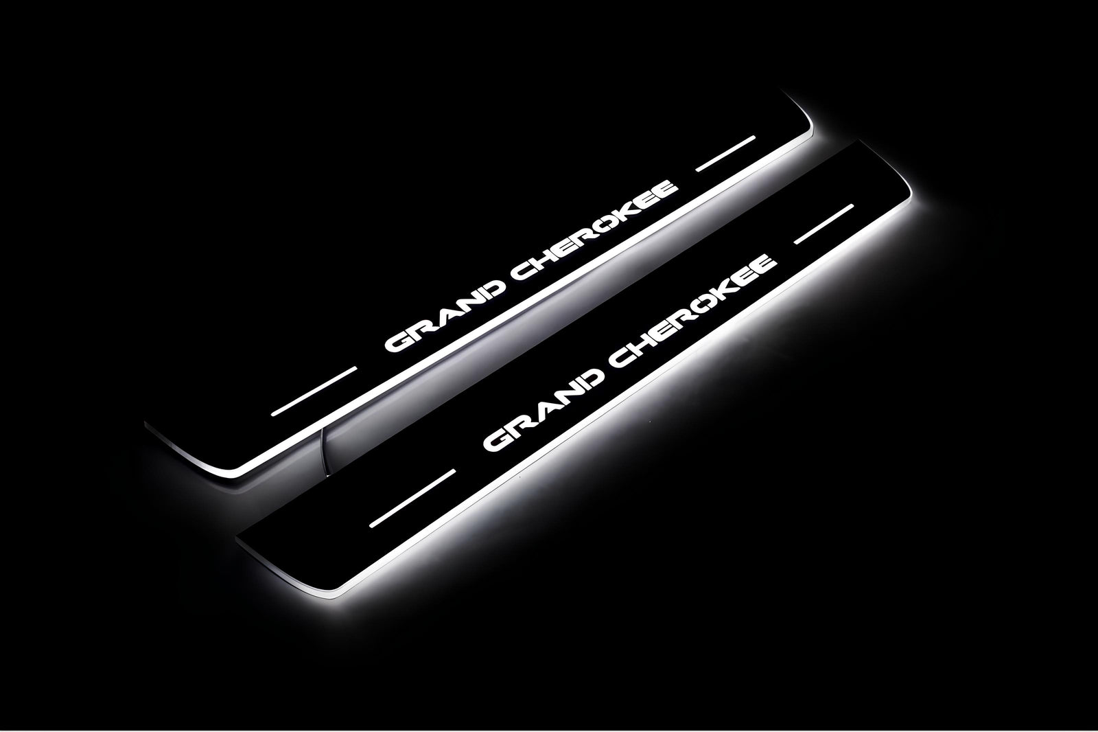 Jeep Grand Cherokee IV WK2 2010+ illuminated entry guards in stainless steel with Grand Cherokee logo