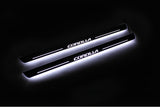 Toyota Corolla XI 2013+ stainless steel LED door sill plates with Corolla logo