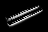 Subaru Outback IV 2009+ entry guards in stainless steel with Outback logo