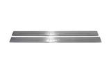 Two long silver-finished door sill plates with H2 lettering on a light background, straight-on view.