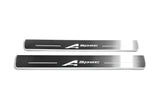Two long silver-finished door sill plates with A-Spec lettering on a light background, straight-on view.