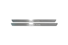 Two long silver-finished door sill plates with Escalade lettering on a light background, straight-on view.