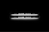 RAM 1500 IV 2009+ illuminated door sill protectors in stainless steel with Illuminated RAM 1500 logo