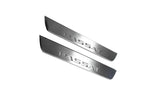 Volkswagen Passat B6 2005+ illuminated entry guards in stainless steel with Passat logo