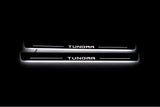 Toyota Tundra IV XK80 2022+ LED door sill plates in stainless steel with Tundra logo