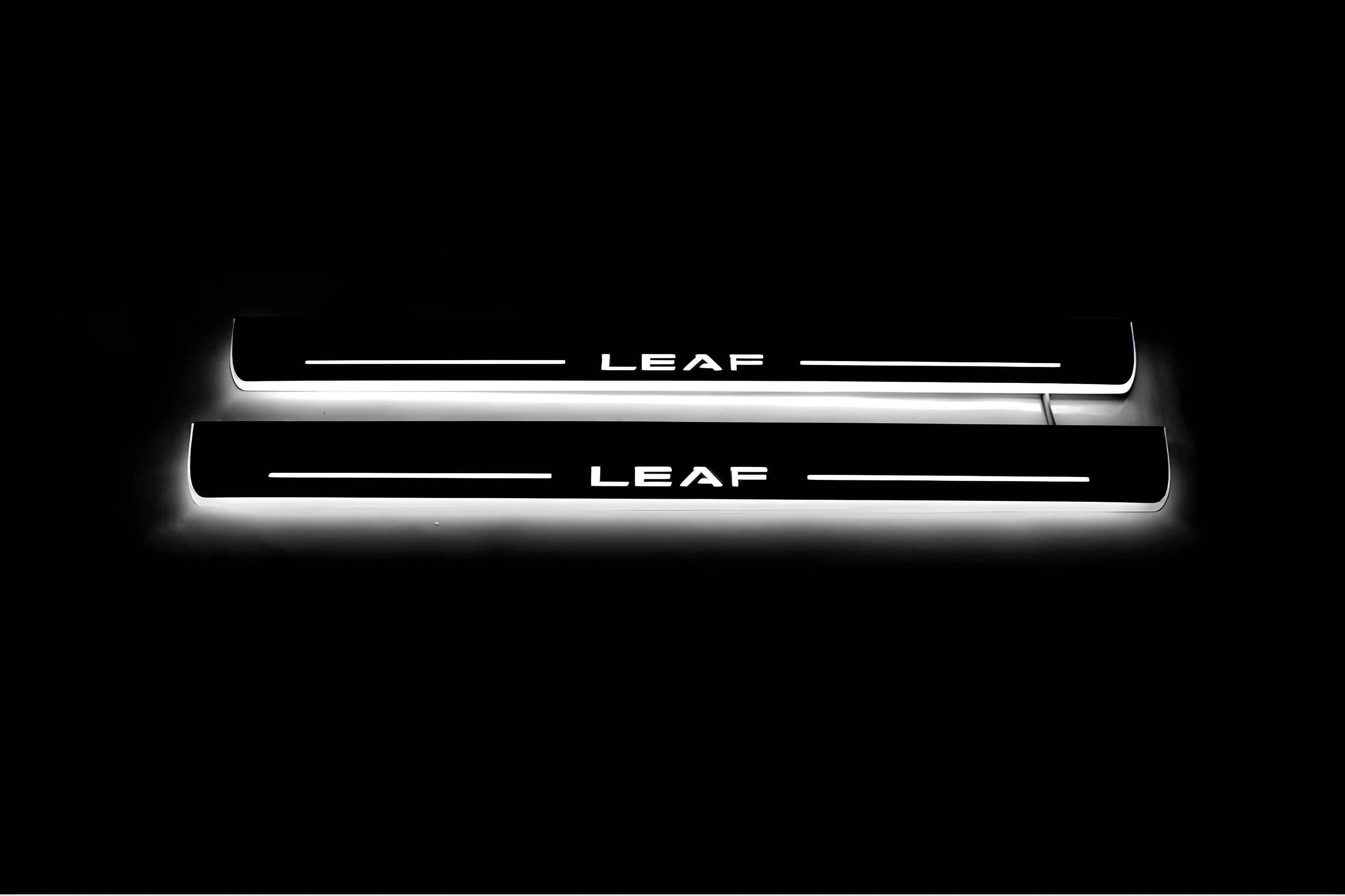 Illuminated LED Door Sill Tread Plates Nissan Leaf II 2017+ With Leaf Logo Nissan Led Door Sills opdesign
